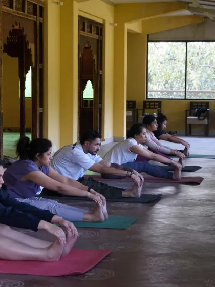 A moment of focused stretching during our Dehradun retreat. It's beautiful to see everyone moving together, each on their own personal journey but sharing the same space and energy.