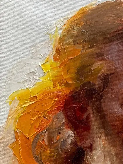 A close-up detail of my impasto technique. I use thick applications of oil paint to create a tangible surface, where light and shadow play across the texture. This method allows me to convey warmth and emotion in a way that feels almost sculptural.