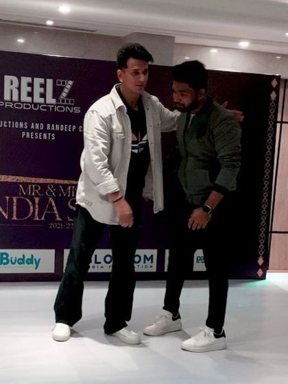 A candid moment on stage with Prince Narula during the 2022 award ceremony.