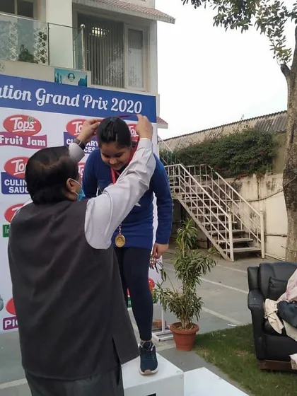 Celebrating another win. One of our students receives her medal at the Guns of Nation Grand Prix 2020, a competition where our academy performed exceptionally well.