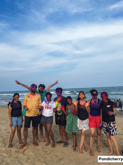 Celebrating Holi on the beaches of Pondicherry. We believe festivals are best celebrated with new friends, lots of color, and the sound of the waves in the background.