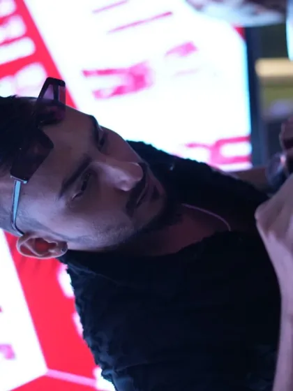 A close-up shot of me fine-tuning a mix. Every transition is crafted to maintain the party's momentum.