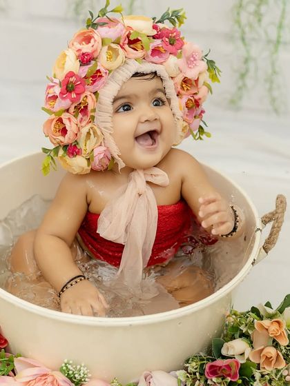 Pure excitement and splashing fun during this six-month sitter session. These are always a favorite with the babies.