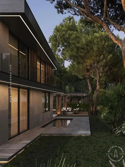 This project showcases how our linear profile lights can be integrated into a building's facade. The continuous line of light accentuates the modern architecture, providing a clean, seamless look that highlights the home's form after dark.