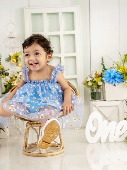 I call myself the "baby giggle hunter" for a reason. Capturing this beautiful, wholehearted laugh during her first birthday studio session was a highlight.