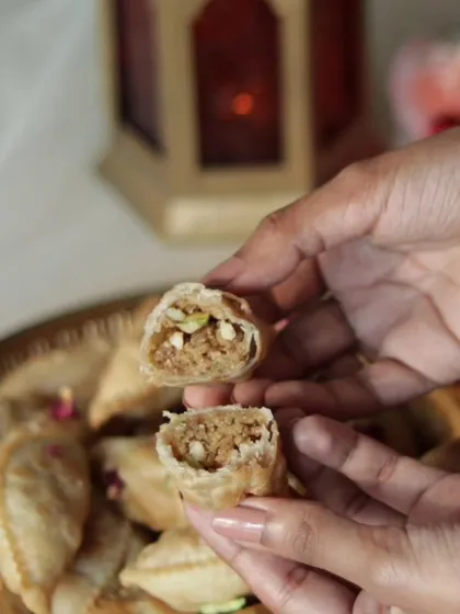 The heart of my Nutty Gujiya, showing the rich, homemade mawa and nut filling. This is my mom's recipe, a taste of my North Indian roots.