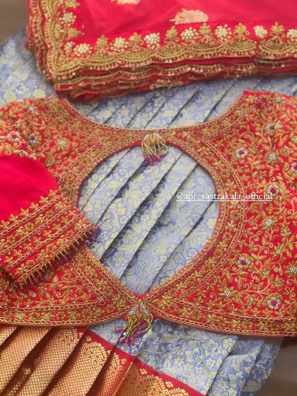 The back of the pink blouse, with a keyhole cutout.