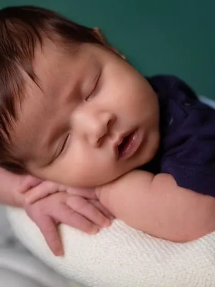 A close-up of our future cricket star, sleeping soundly before the big match.