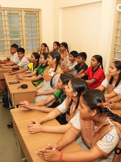 A classroom full of attentive students, eager to soak in their weekly music lesson.