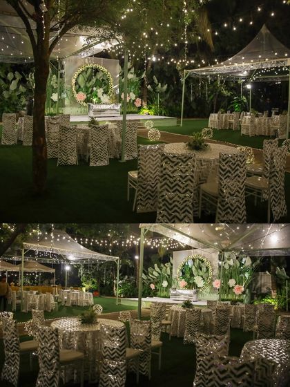 The perfect setting for a pre-wedding cocktail party or sangeet night. The lawn provides ample space for a dance floor, while the surrounding trees, lit with elegant chandeliers and string lights, create a festive and celebratory atmosphere.