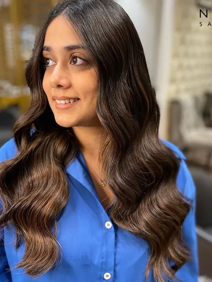 Another beautiful balayage babe. The soft, flowing waves and perfectly blended colour create a look of effortless glamour.