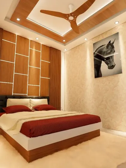 This perspective shows the textured wallpaper and horse artwork opposite the bed, adding a personal touch to the room's design.