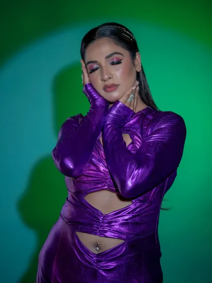 Another pose from the high-fashion shoot, with eyes closed to show the eyeshadow detail.