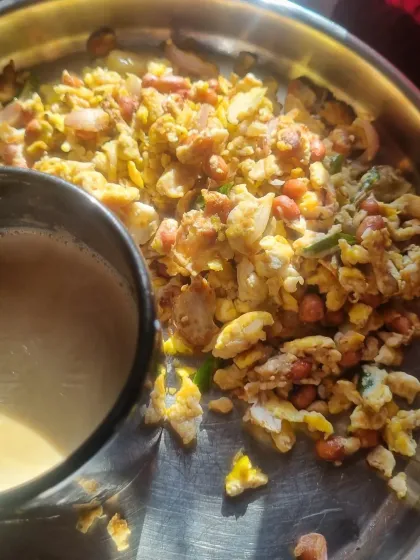 A simple, sustainable, and healthy meal of scrambled eggs with peanuts and a cup of tea. Real food is the best medicine.