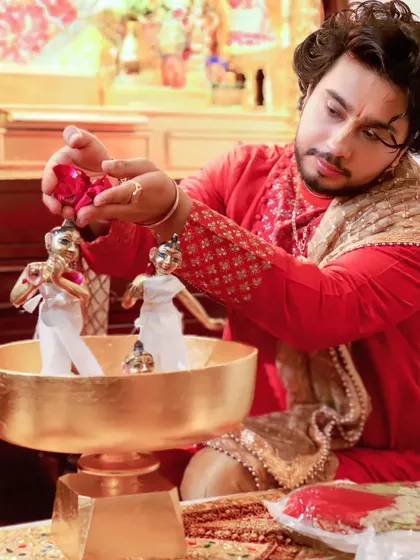 Preparing the 'bhog' and bathing the deities of Giridhari Gopal is a daily act of love. This is not a ritual but a heartfelt conversation with my Thakur Ji. My art is born from these moments of complete surrender and devotion.