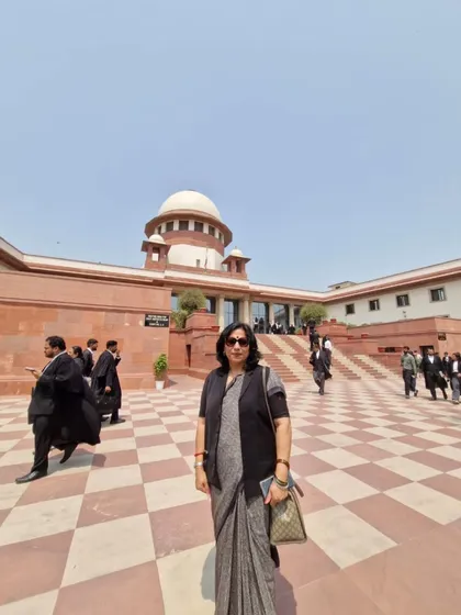 A moment of reflection outside the Supreme Court of India. I was here for a Public Interest Litigation to make workplaces safer for women by strengthening Internal Complaints Committees. The fight for justice often leads to the highest court in the land, and I am prepared to go the distance for my clients and causes.