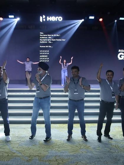 A fun, interactive segment on stage at the Hero NDPC'25. We manage all types of on-stage activities, from formal presentations to team-building exercises.
