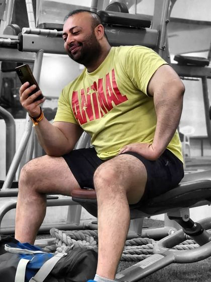 A candid moment in the gym. The Animal shirt says it all.