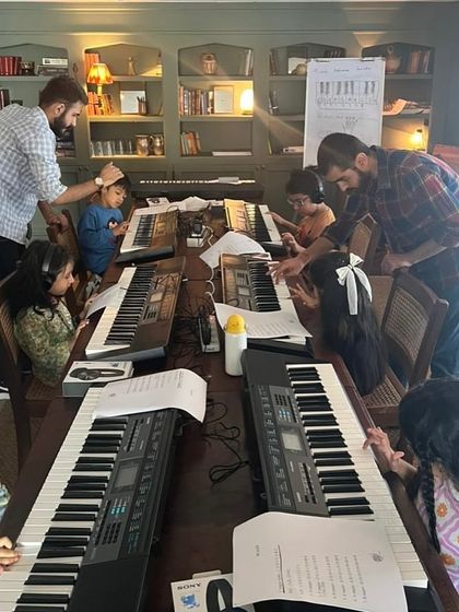 Another angle from our popular keyboard workshop at Soho House. You can see the mentors giving individual attention to help the kids learn their first notes.