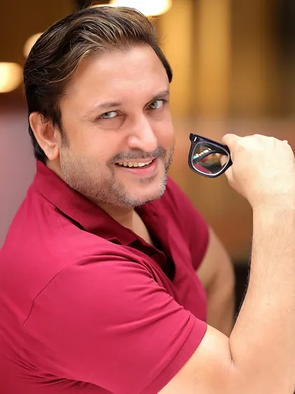 A playful and engaging shot of Sanjev Sharma. Capturing these moments of personality is key to a successful actor portfolio.