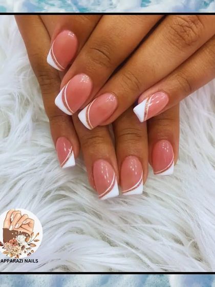 A modern twist on the French manicure, with a clean white tip and a thin gold line accent for a touch of elegance.