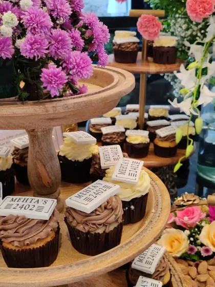 Custom cupcakes with personalized toppers for the Mehta family's housewarming. These small, thoughtful details are what make an event truly special, and we love adding a personal touch to our catering.