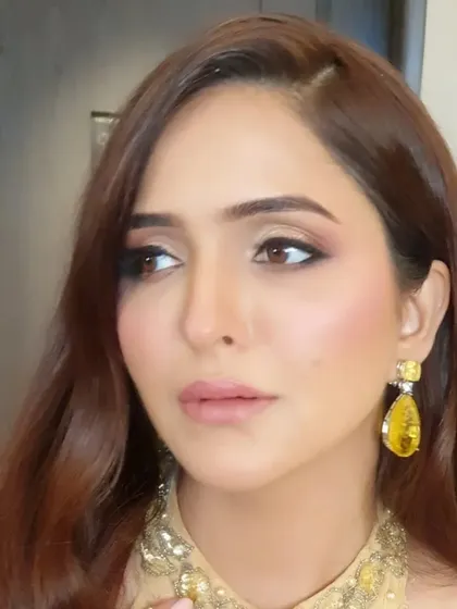 A side profile of Sonam's event makeup. This angle highlights the soft contouring, glowing skin, and the way the eye makeup is blended for a seamless, elegant finish.