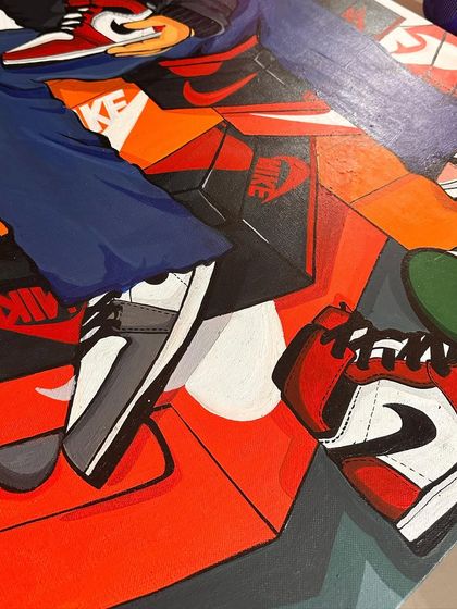 A close-up detail of the sneaker art, showing the clean lines and layered composition of different shoes and branded boxes.