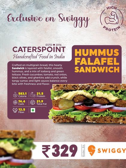 The Hummus Falafel Sandwich is a Mediterranean dream. We layer baked falafel, smooth hummus, and fresh veggies like cucumber and tomato on multigrain bread, giving you 21.5 grams of protein in a delicious, plant-based package.