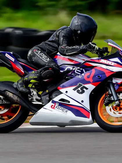 In her first year earning championship points, Poojita AK pilots her race-prepped Yamaha R15 at the Madras International Circuit. This was a breakthrough season, proving her potential.