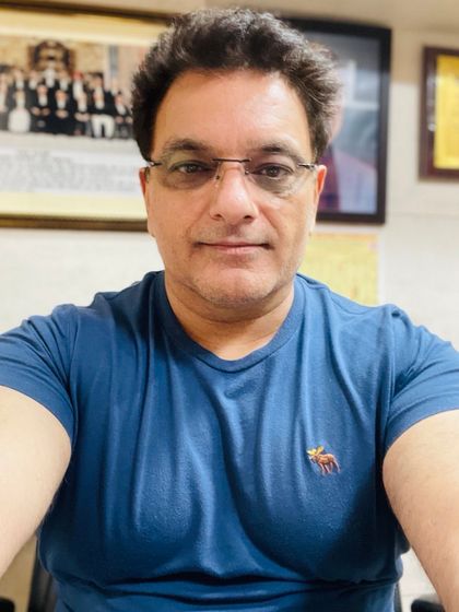 A moment of focus in my office. Every day brings a new challenge, and I am always ready to meet it head on.