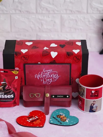 This hamper is perfect for showing your love. It includes a personalized mug, custom eyewear case, heart-shaped coasters, and chocolates, making it a complete and thoughtful gift.