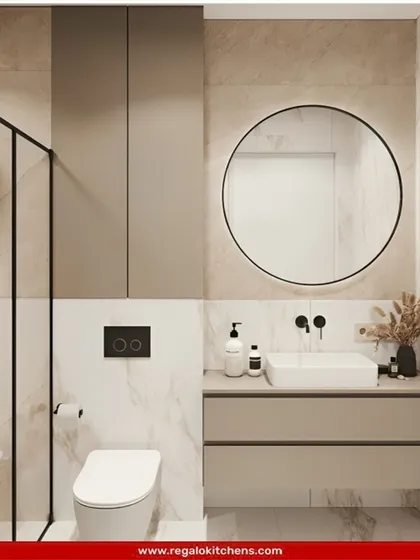 A minimalist's dream. This simple yet elegant vanity features a clean, two-drawer design in a neutral tone, complemented by black fixtures and a round mirror.