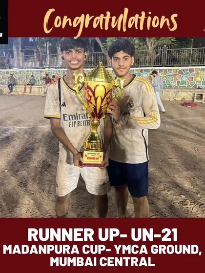 Two of our U-21 players holding the runner-up trophy, a result of their resilience and teamwork against tough competition.