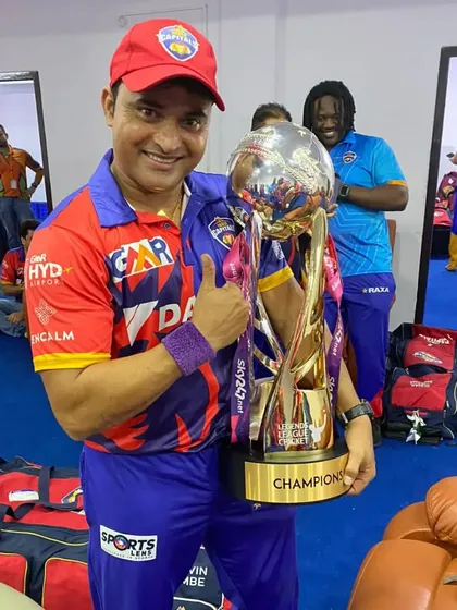 Holding the Legends League Champions trophy in the locker room. A proud moment that shows what hard work can achieve.