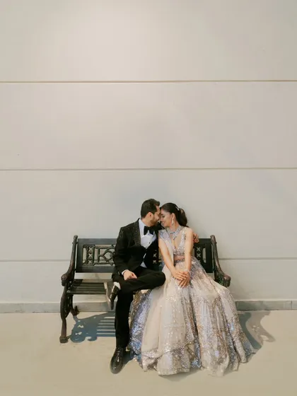 An elegant Sangeet night portrait. I love capturing the quiet intimacy amidst the grand celebrations, where a couple can steal a moment that is just for them, a silent symphony against the music.