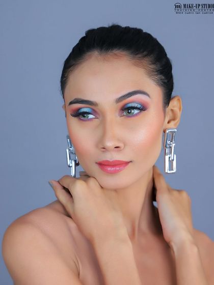 Another angle of the creative look, showing how the colors blend and interact. This is where makeup becomes true artistry.