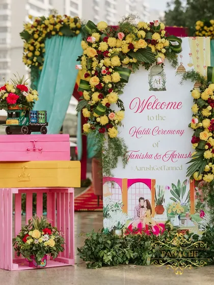 Another angle of the beautiful welcome signage, showing how it integrates seamlessly with the overall floral and color theme of the event.
