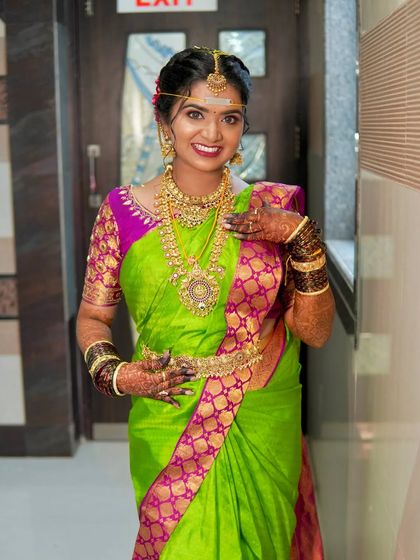 This is another view of our popular antique bridal set, showing how it beautifully frames the bride's smile. The set is designed to be substantial yet comfortable enough to wear throughout your wedding ceremony.