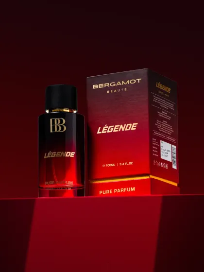 A bold and dramatic shot for a Valentine's Day campaign. We used a special lighting projector to create an interesting light pattern on the red background, making the perfume bottle and its packaging stand out.