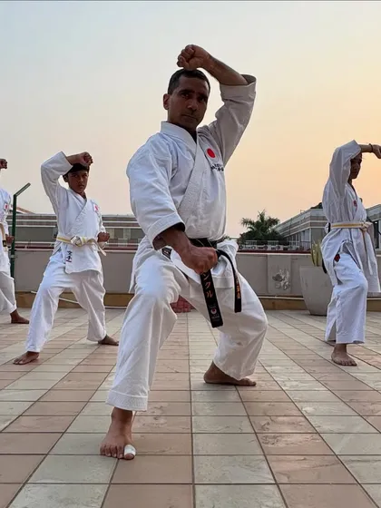 Discipline and unity are forged in group practice. Here, I lead an outdoor session, guiding students through kata. Training together builds a strong sense of community and shared purpose.