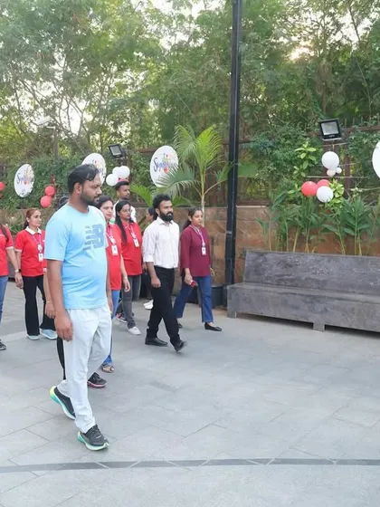 Walking with the staff and students at the Witty International School event. Community engagement is a core part of our mission.