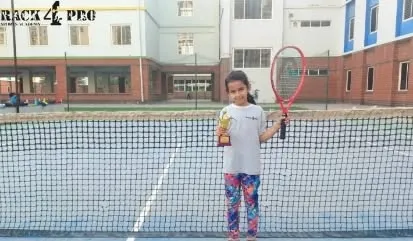 Bhargavi Aditri stands proudly with her trophy. This is just the start of an incredible journey for our young tennis star.