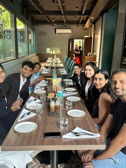 The team at a farewell lunch for Ashwini.