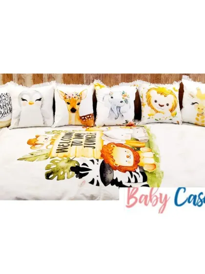 A closer look at the jungle-themed pillows. Each pillow features a different friendly animal face, from a giraffe to a penguin, adding a playful and educational element to the crib.