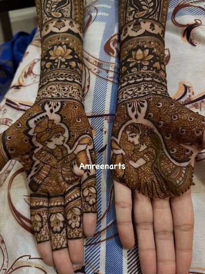 A detailed close-up of the bride and groom figures, showcasing the fine lines and shading that create such lifelike portraits.
