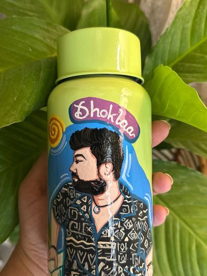 A custom photo-based portrait painted on a Milton bottle for a client. We take your favorite photo and transform it into a piece of functional art you can carry with you.