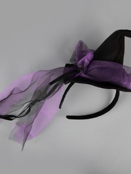 A witch hat headband with purple and black tulle.