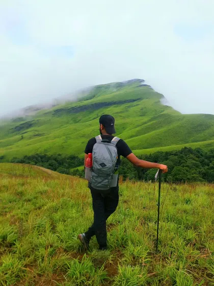 Finding my secret garden in the mountains. This is a candid shot from one of our treks, capturing the feeling of escaping into nature.