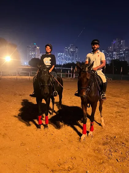 Our arena transforms after sunset, offering a unique location for a romantic couple's photoshoot. The dramatic glow of the Noida cityscape provides a stunning urban equestrian backdrop.